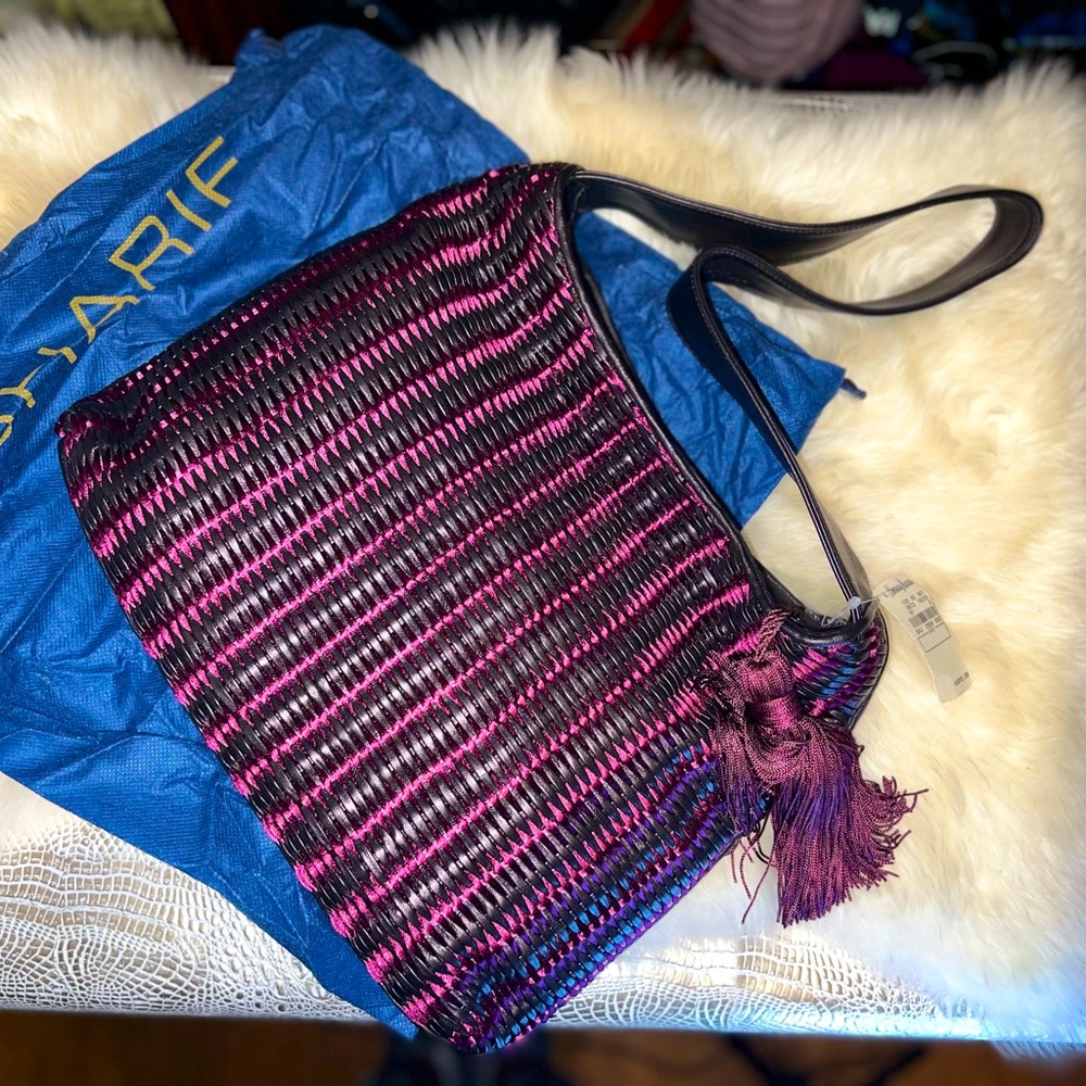 Sharif basket weave leather shoulder bag.
